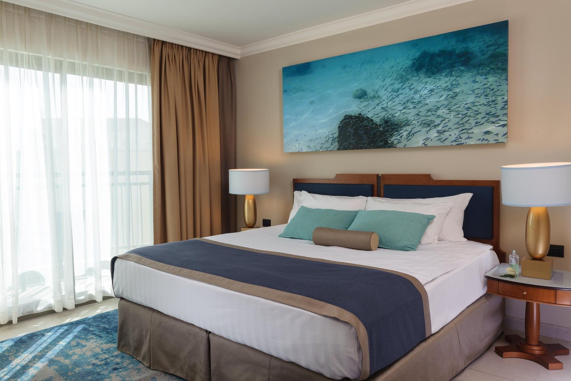 유 매직 팰리스 호텔 엘라트 외부 사진 A bedroom at the resort